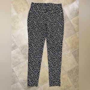 MICHAEL KORS black and white animal print leggings.